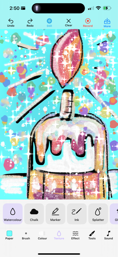 A birthday cake drawn in Rivaurie on teal paper, surrounded by glitter and thrown splatter