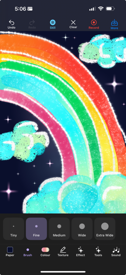 A rainbow drawn in a single stroke on dark paper, with glittering clouds